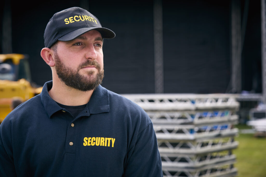 male-security-team-member-outdoors-as-stage-for-mu-2024-10-22-06-01-04-utc